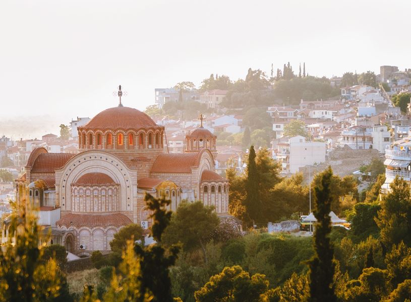 View of the Church St. Paul and Thessaloniki city at sunset, Greece