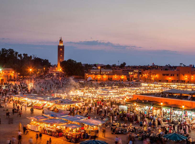 Sceniew view of Jemaa el Fna square at dusk in Marrakesh, Morocco