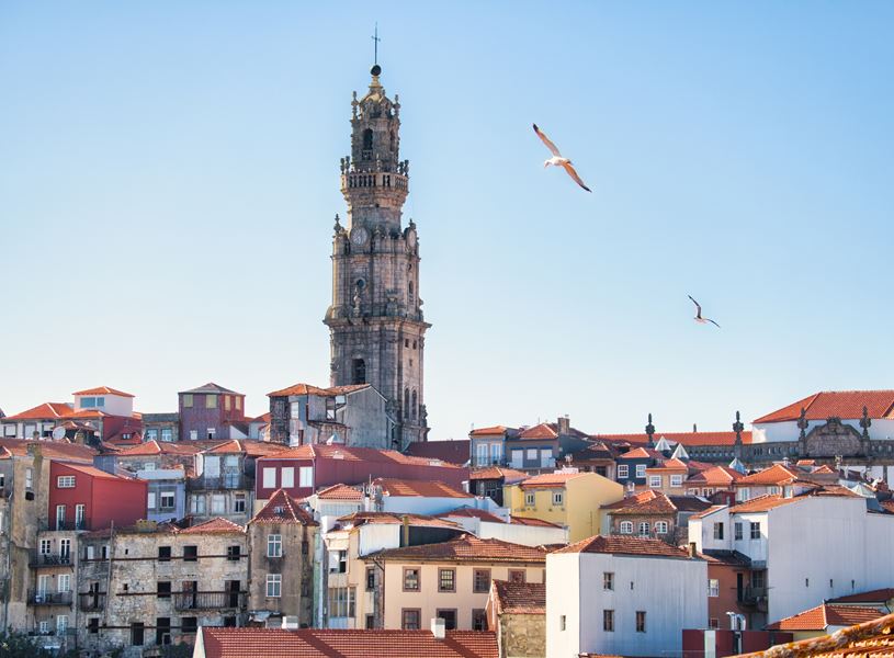 Clerigos Tower and city roof tops in Porto, Portugal 