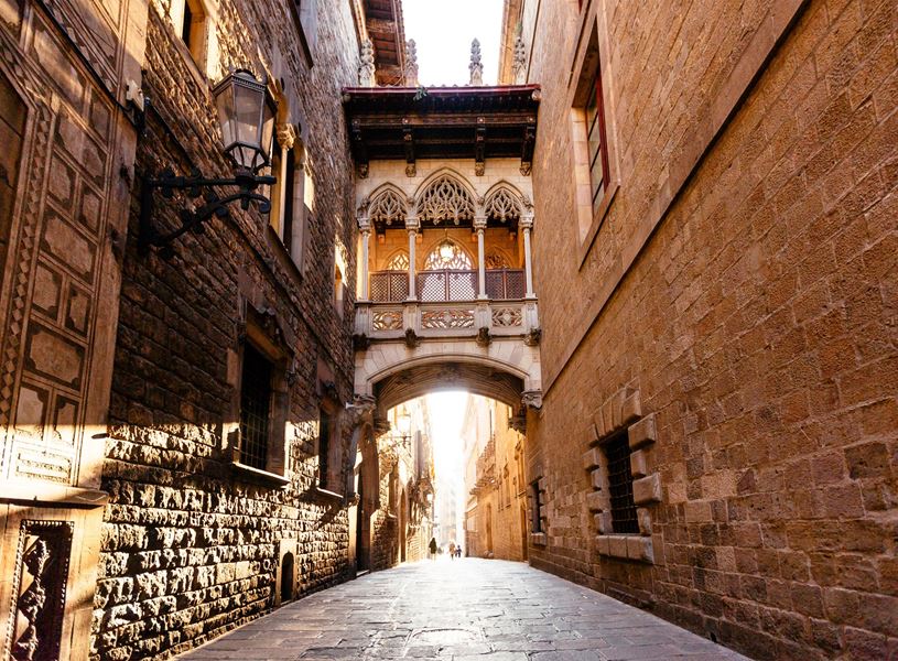 Street with arch in the Gothic Quarter in Barcelona, Spain