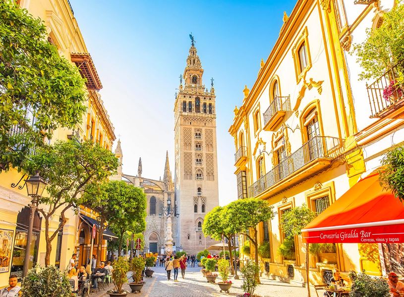 Old town street of Calle Mateos Gago, Seville, Spain