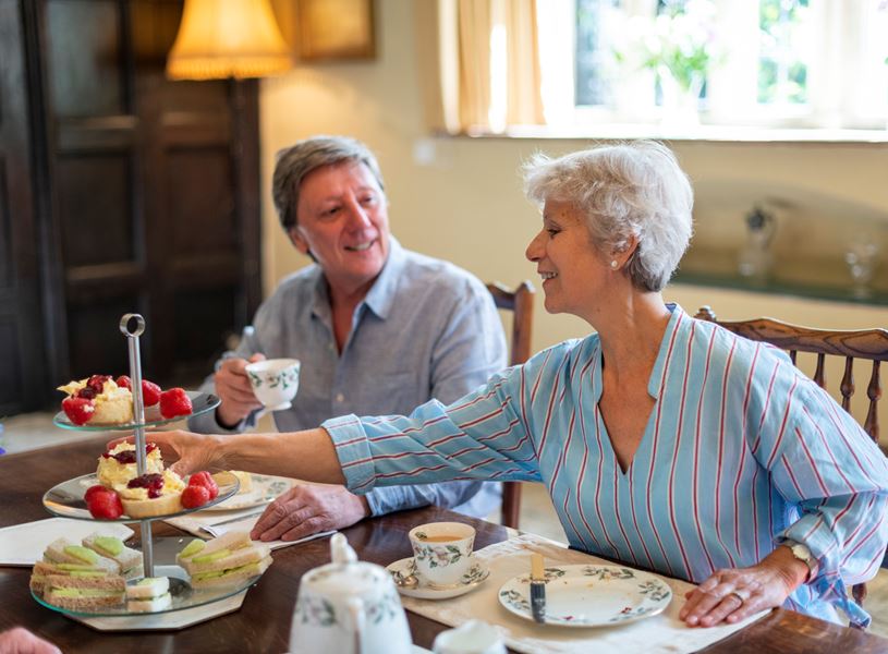 Guests enjoying cream tea at Sand House, Dorchester, England