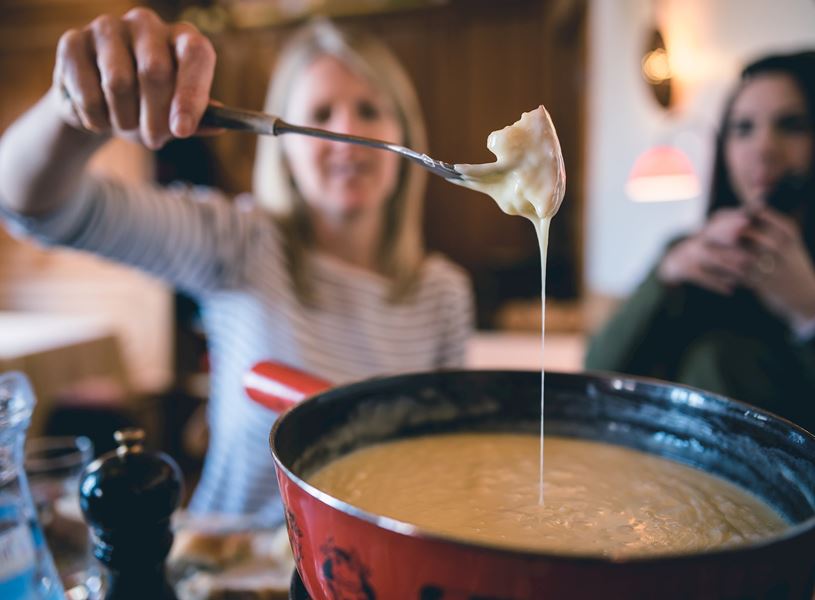 Try Swiss fondue in Gruyeres
