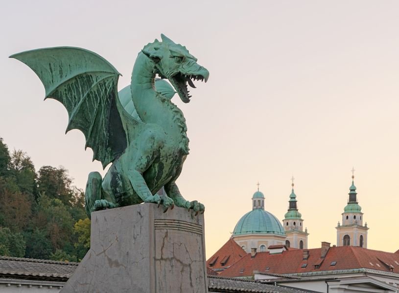 A dragon statue on dragon bridge in Ljubljana, Slovenia