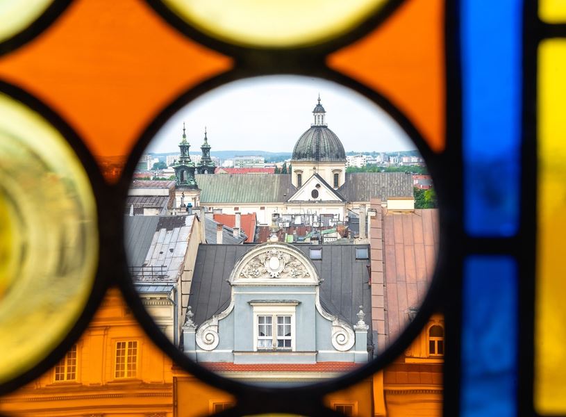 Rooftops through a stained glass window in Krakow, Poland