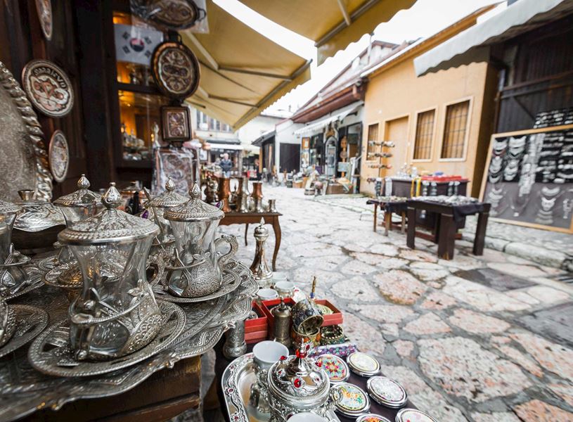 Intricate silverware and other items displaying at market stalls in Bosnia and Herzegovina