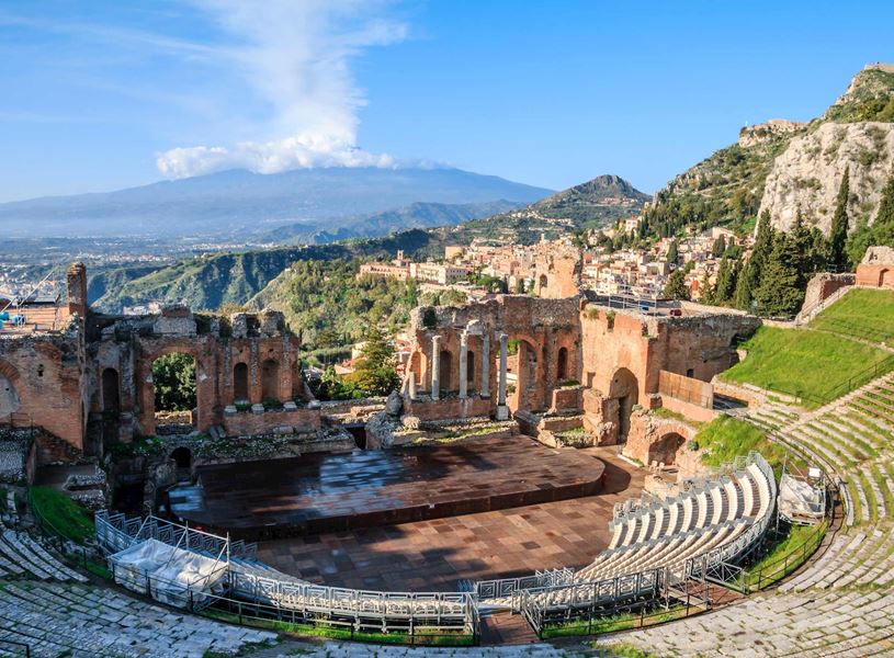 Greek Theatre and Mount Etna in Taormina, Italy