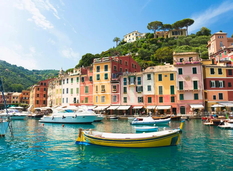 Colourful waterfront buildings and boats in Portofino, Italy