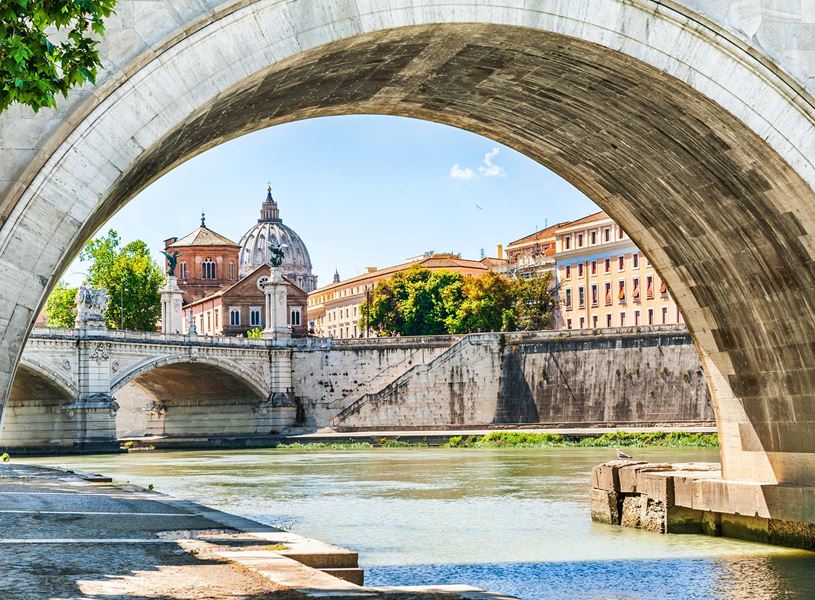 Tiber River and St Peters Cathedral in Rome, Italy