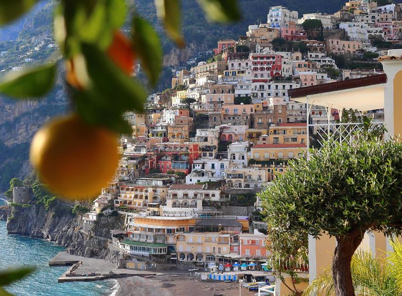 Colourful cliffside houses of Positano on the Amalfi Coast with lemon tree
