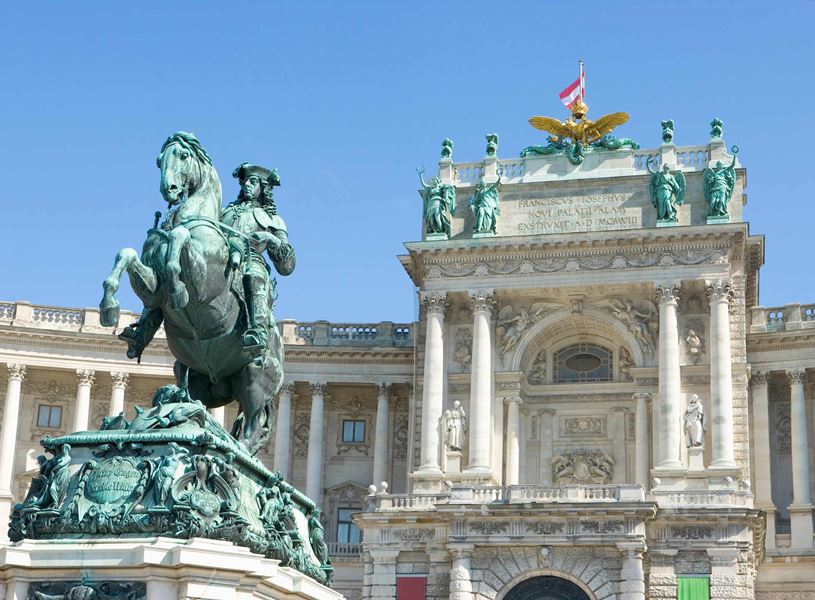 Statue of Prince Eugen of Savoy and Hofburg Palace in Vienna, Austria