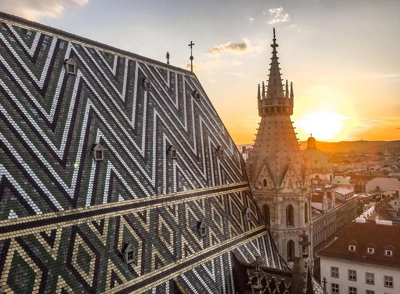 St. Stephen's Cathedral roof and spire at sunset in Vienna, Austria