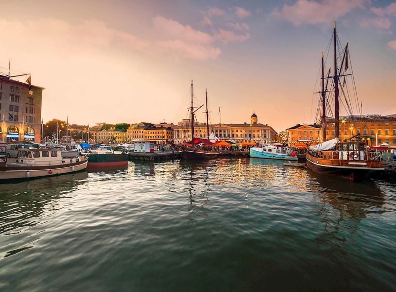 Old Port Pier with boats at sunset in Helsinki, Finland