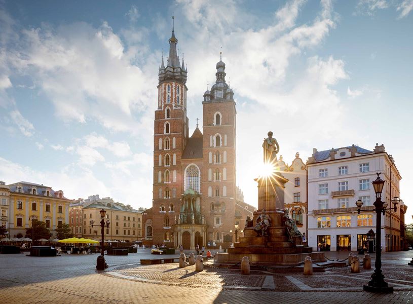 Adam Mickiewicz Monument and St Mary's Basilica in Krakow, Poland