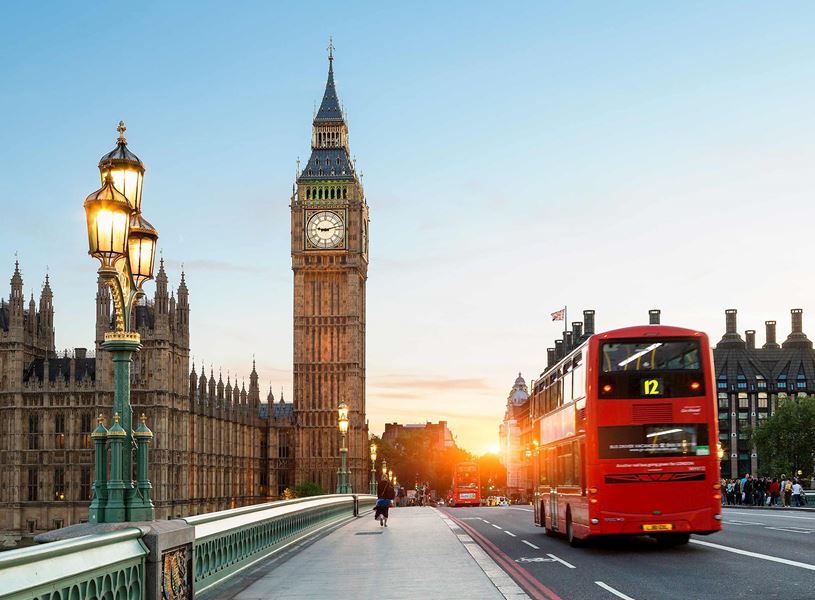 Big Ben and Westminster Bridge with iconic red London bus