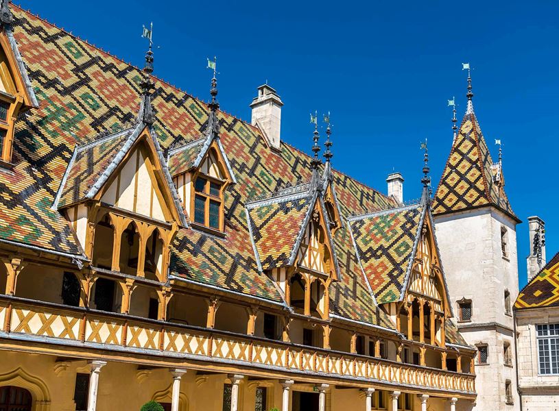 Hospices de Beaune roof with colourful geometric tile patterns in France
