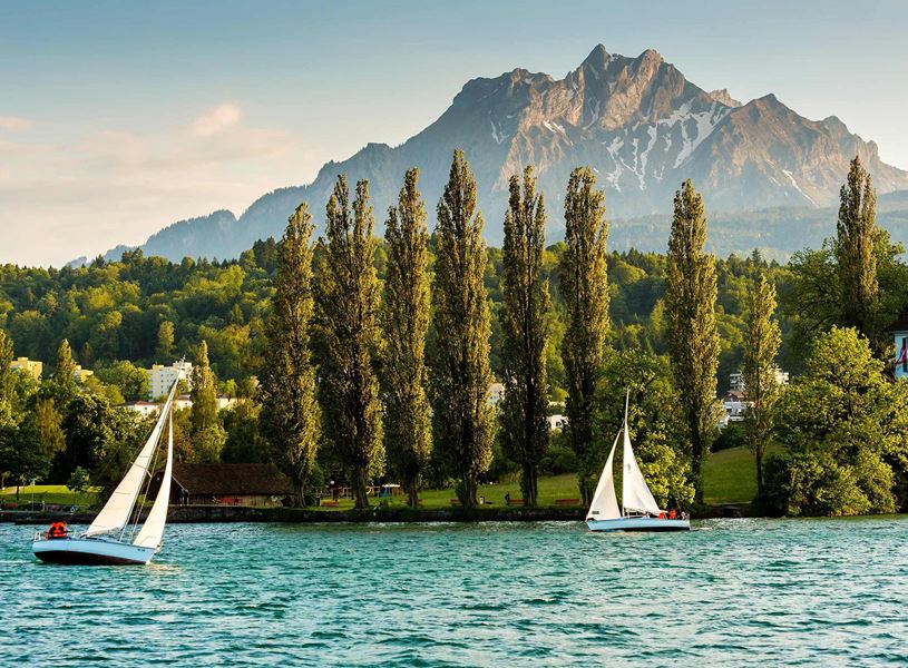 Mt Pilatus and Yachts in Lake Lucerne, Switzerland