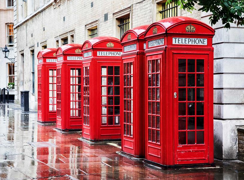 Row of Iconic Red Telephone Boxes in London, England