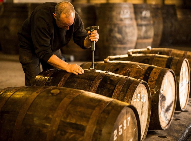 Opening whisky cask in Glasgow, Scotland