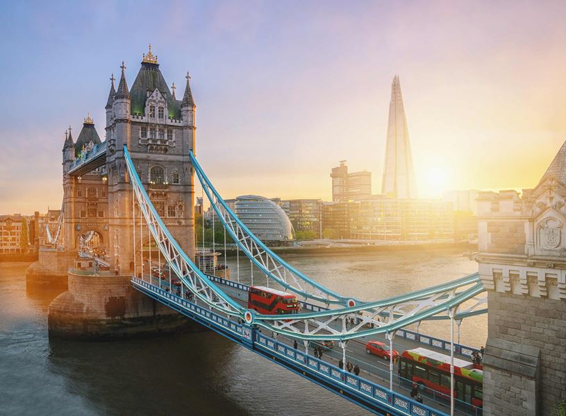 Tower Bridge in London at sunset with The Shard visible