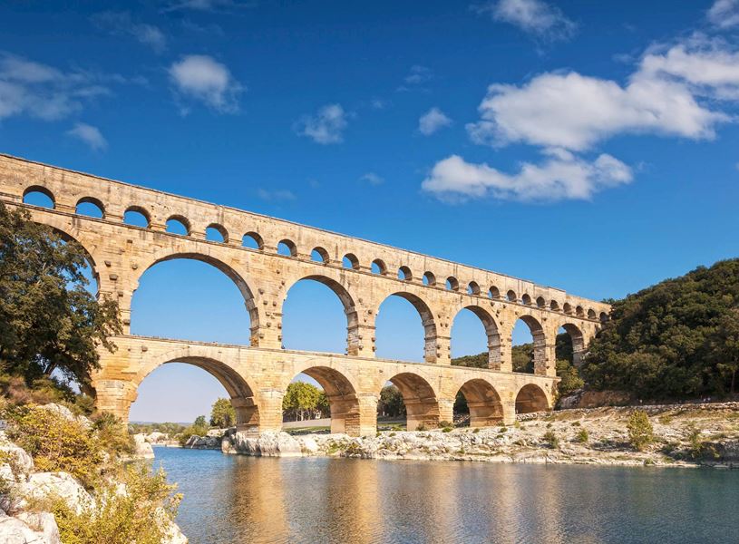 Roman Aquaduct Pont du Gard spanning Gardon River in Nîmes, France