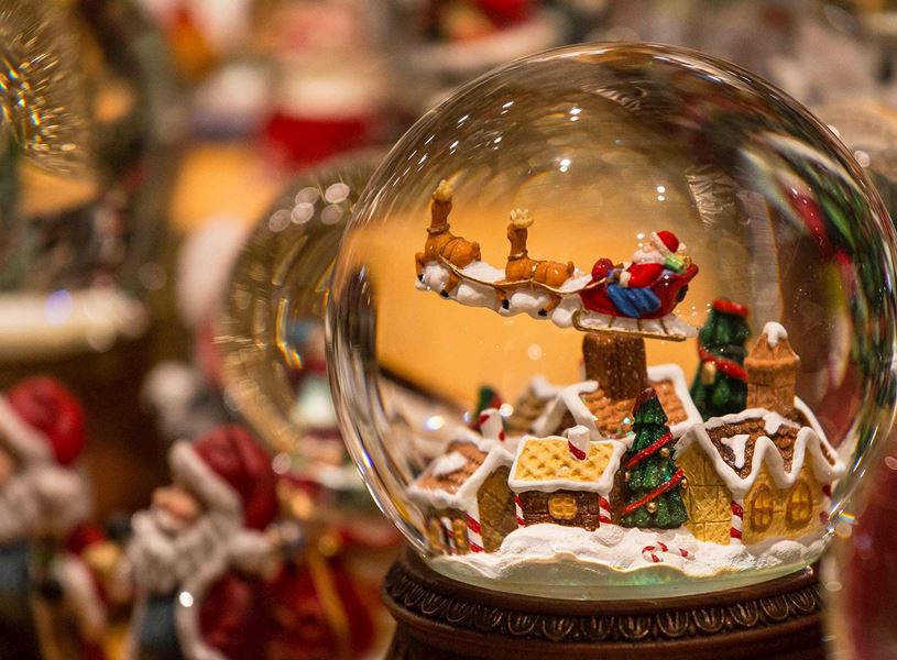 Christmas Snow globe with Santa, reindeers and snowy village in Vienna, Austria
