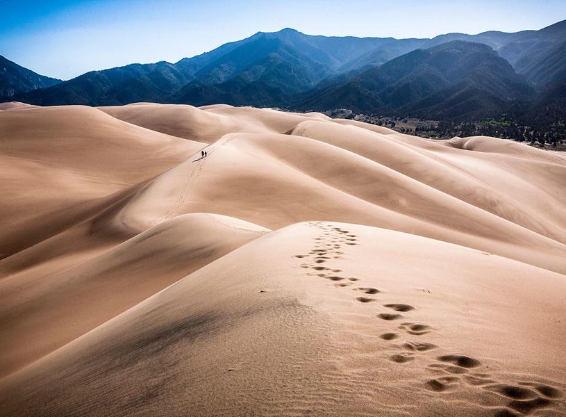Hikers in the Great Sand Dunes, USA
