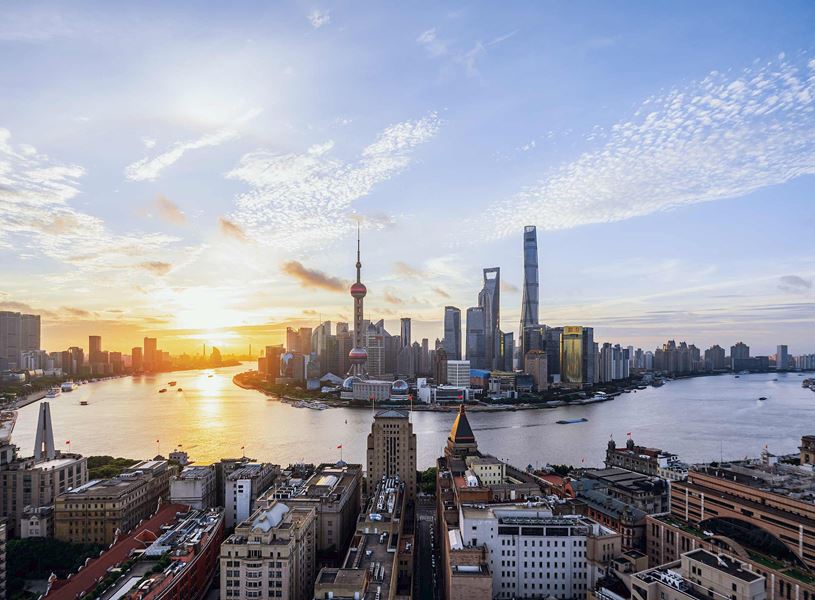 Aerial panoramic sun glowing view of Shanghai, China