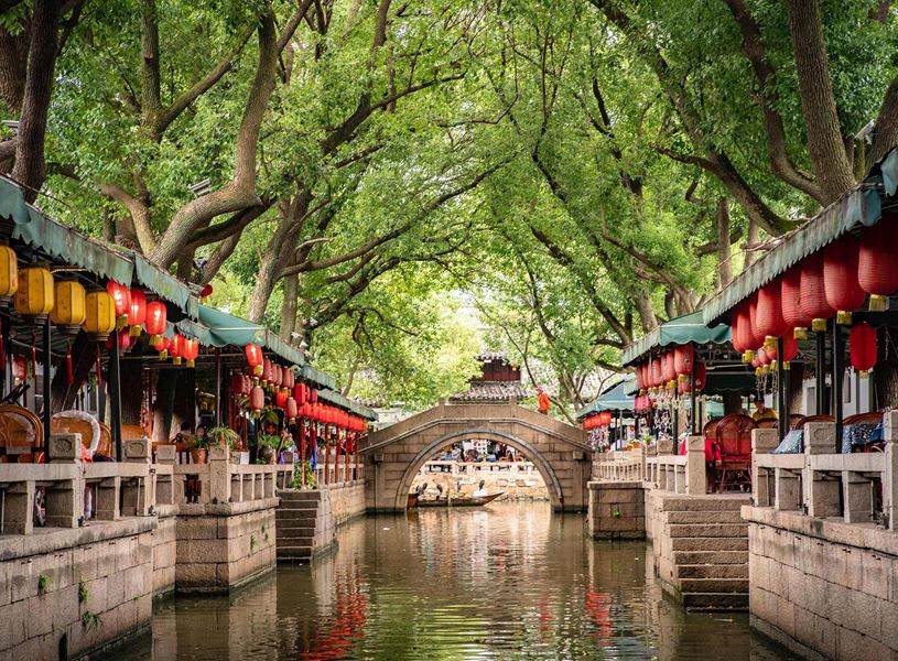 Waterway leading to bridge in Tongli Water Town, Zhujiajiao, China