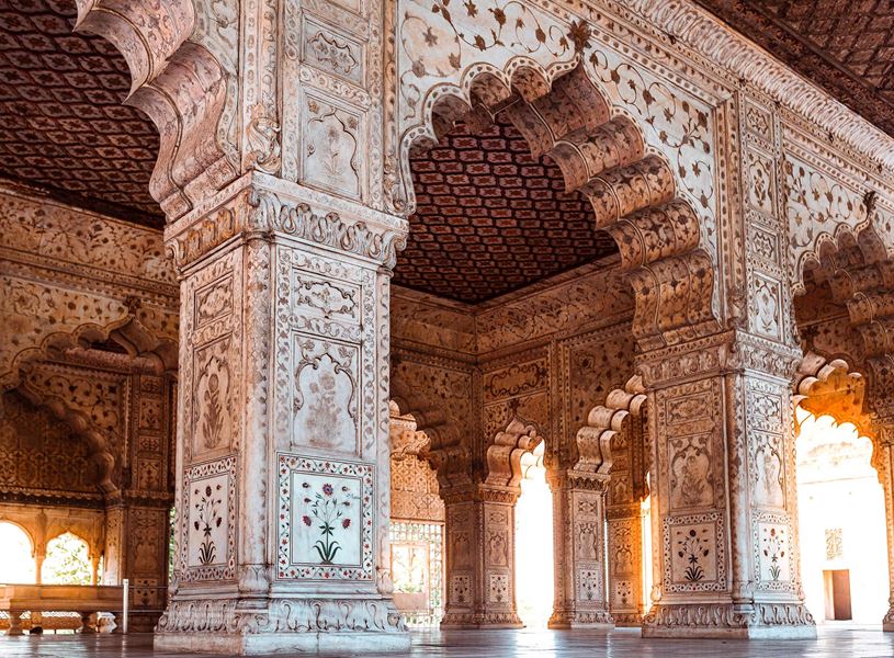 White marble arches and pillars with Mughal patterns inside Red Fort Delhi, India