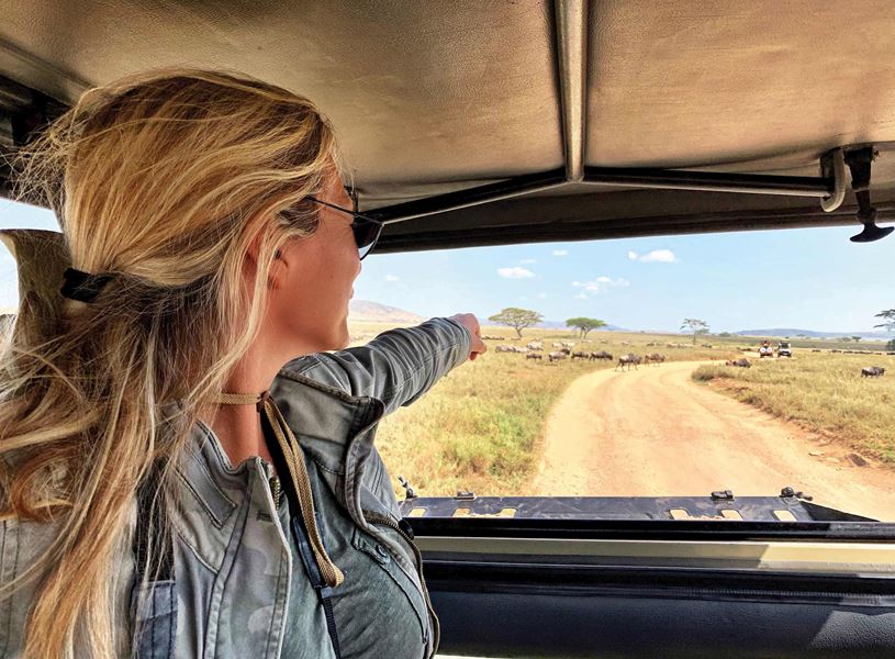 Woman on Safari in Serengeti National Park, Tanzania