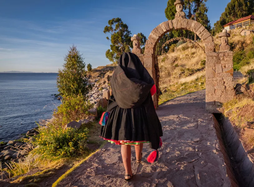 Woman a wool by hand on Taquile Island, Lake Titicaca, Peru