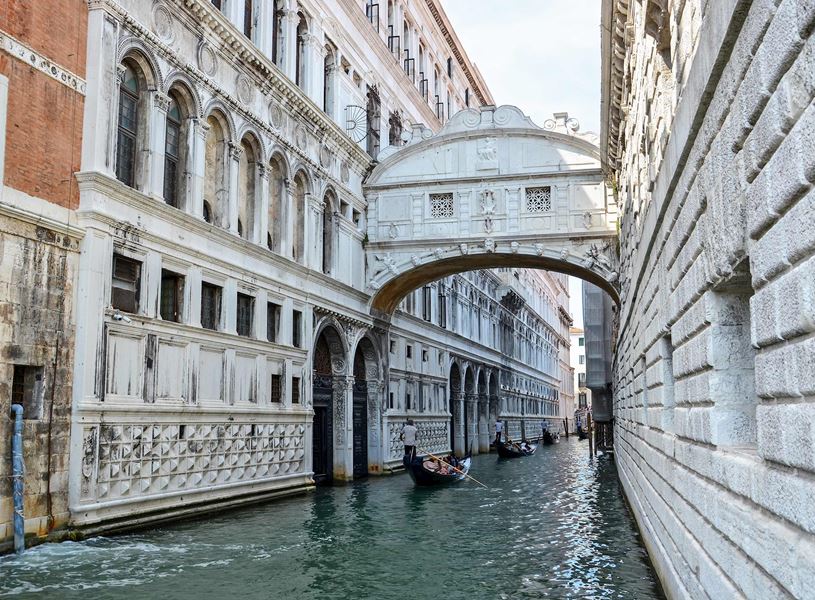 Gondola under The Bridge of Sighs in Venice, Italy