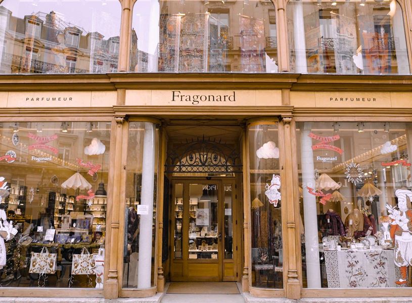 Fragonard perfume shop storefront with glass displays in Paris, France
