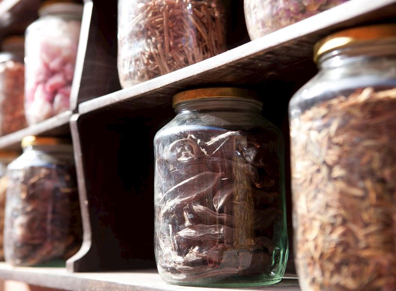 Visit a Moroccan pharmacy to learn about local healing creams and cosmetics in Marrakesh, Morocco
