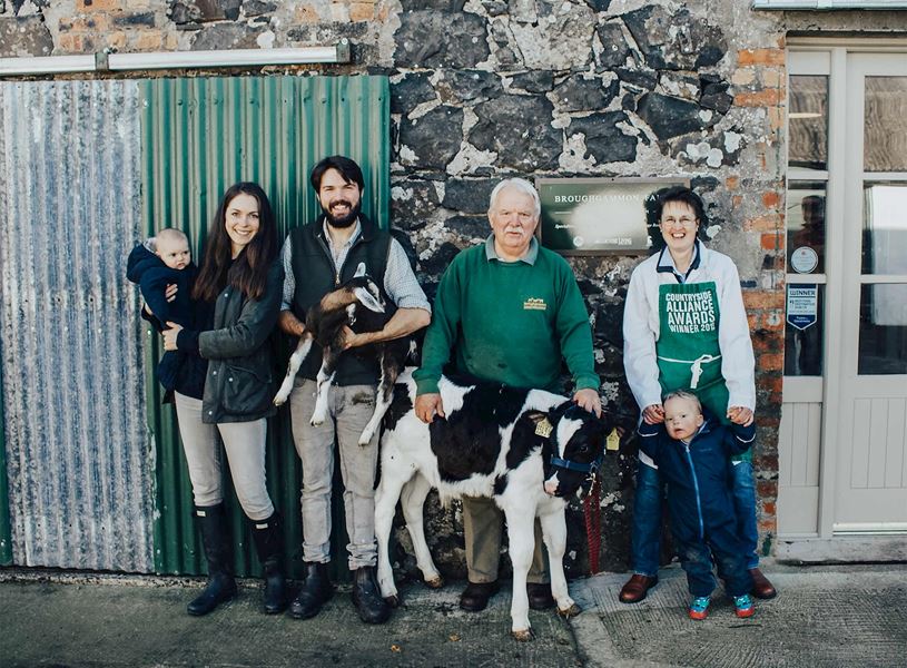 The Cole family standing outside Broughgammon Farm, Ballycastle