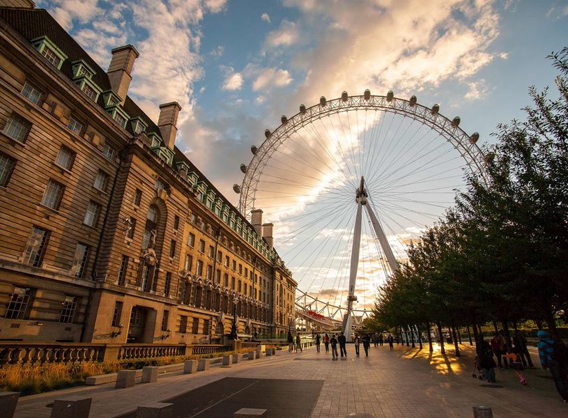 London Eye Ferris Wheel at sunset in London, England
