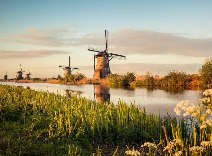 Row of traditional Dutch windmills in Kinderdijk, Netherlands 
