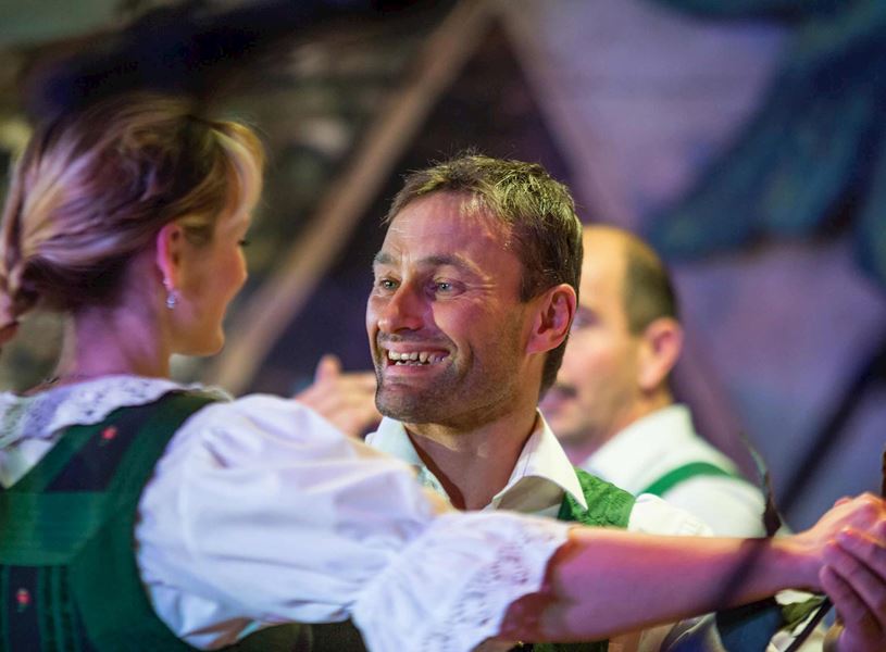 Entertainers in national costumes dancing in Innsbruck, Austria
