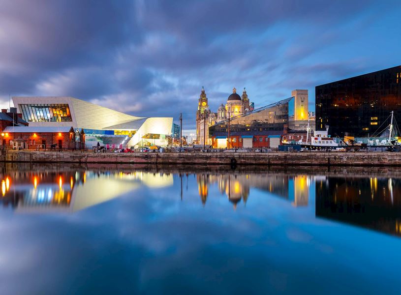 Liverpool waterfront with city architecture at dusk in England