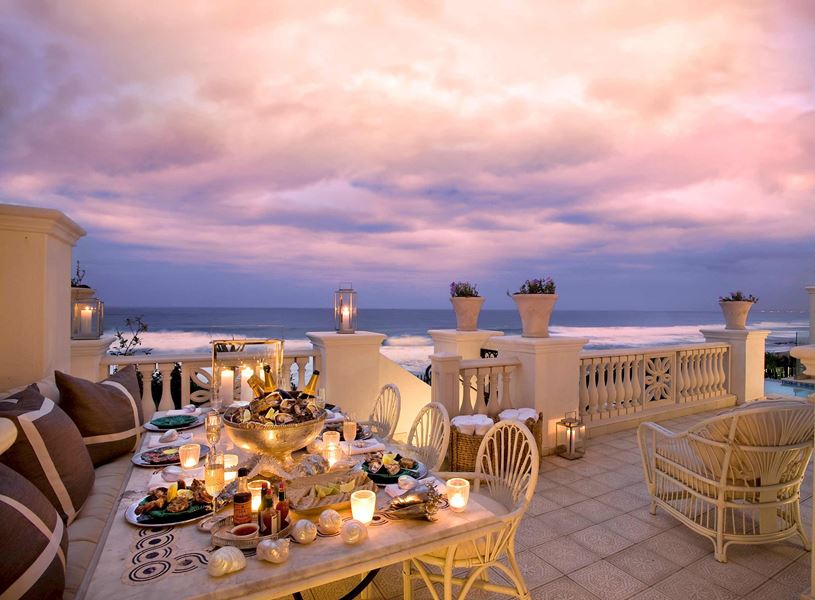 Oyster Box Hotel terrace with ocean view dining, Durban, South Africa