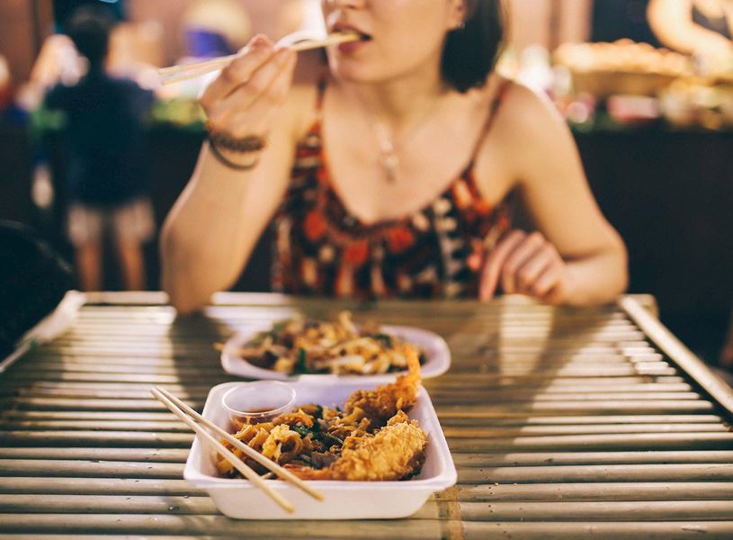 Visit a food market with your culinary host and shop for local produce in Bangkok