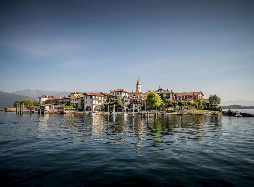 Isola dei Pescatori village on Lake Maggiore with calm water view