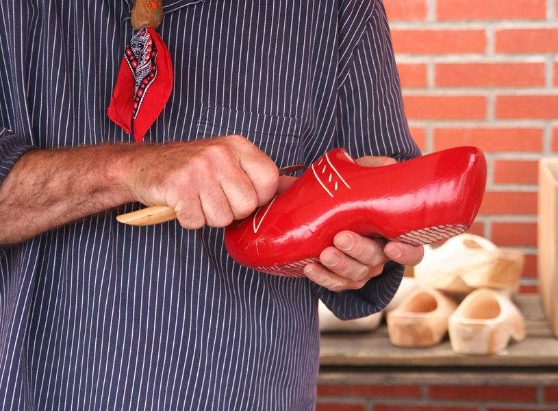See wooden shoes being handcrafted in the traditional Dutch fashion in Amsterdam, Netherlands