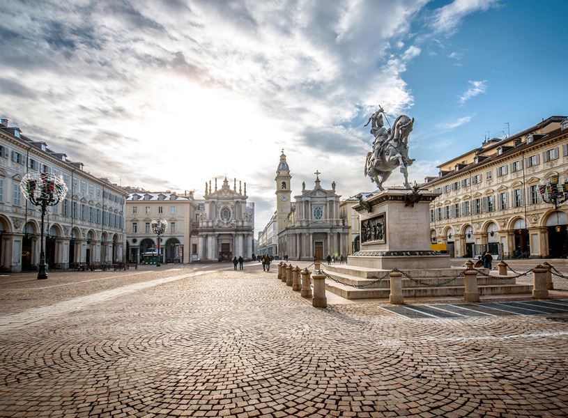 Piazza San Carlo with equestrian statue, historic arcades and twin churches in Turin