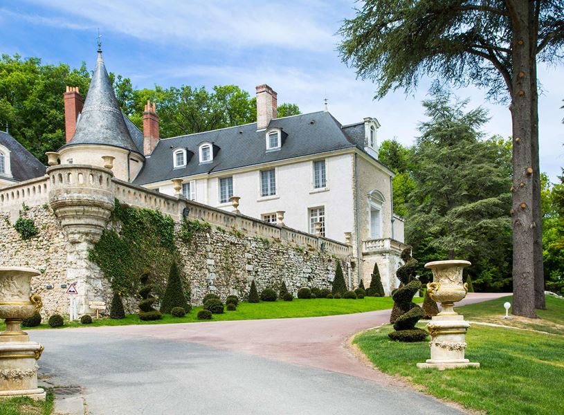 Château de Beauvois with turret, ivy covered walls and manicured gardens in Loire Valley, France