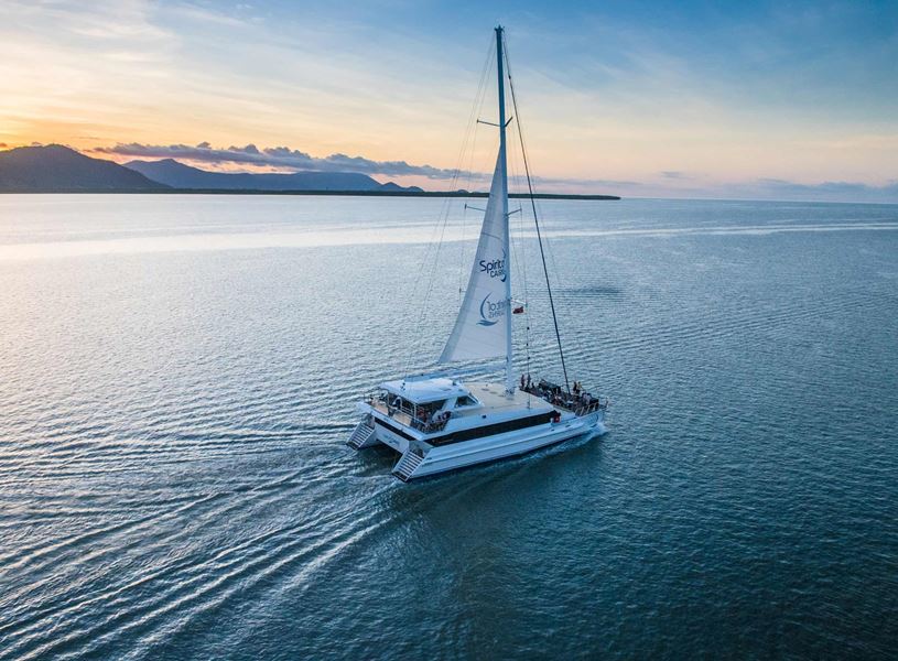 Enjoy a dinner cruise aboard the luxury catamaran Spirit of Cairns in Australia