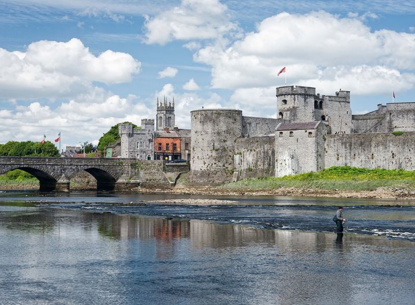 King John’s Castle and stone bridge overlooking River Shannon in Limerick
