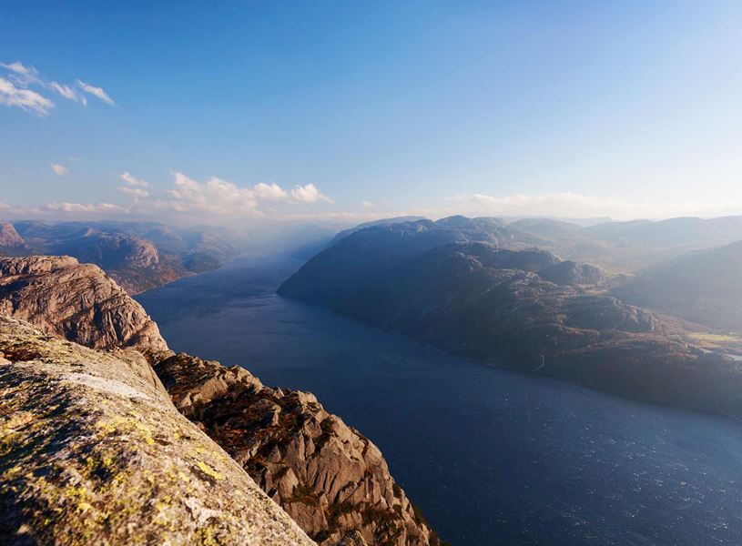 Panoramic view of Lysefjord in Norway with steep cliffs and deep blue water