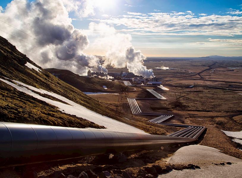 Hellisheidi geothermal power plant with steam and pipelines